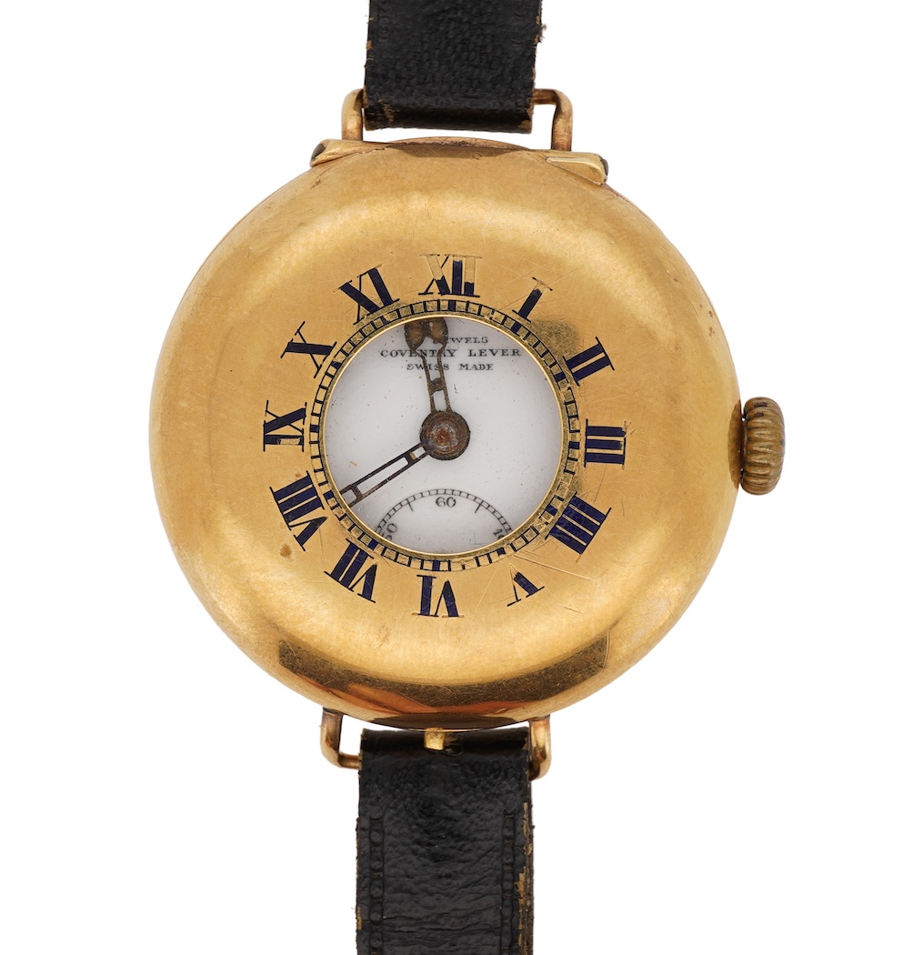 A gentleman's early to mid 20th century 18ct gold half hunter Coventry lever manual wind wrist watch